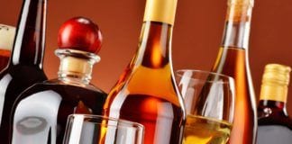 What’s Next for NJ Wine & Spirits in 2016 Bottles and glasses of assorted alcoholic beverages.