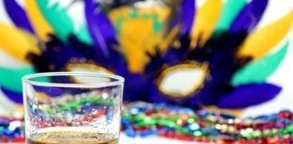 Celebrate Mardi Gras with These NOLA-Inspired Cocktails Drink with Mardis Gras Mask