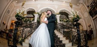 Charles Anthony Studio ceremony photo of bride and groom