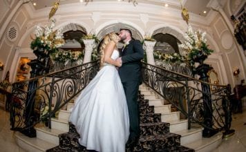 Charles Anthony Studio ceremony photo of bride and groom