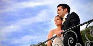Jessica Lauren Photography Jessica Lauren Photography Bride and Groom on balcony