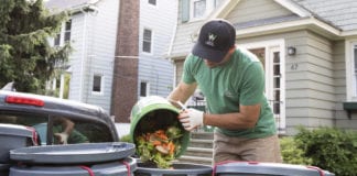 Garden State Gardening: How-To Composting Tips Man pouring compost into bin